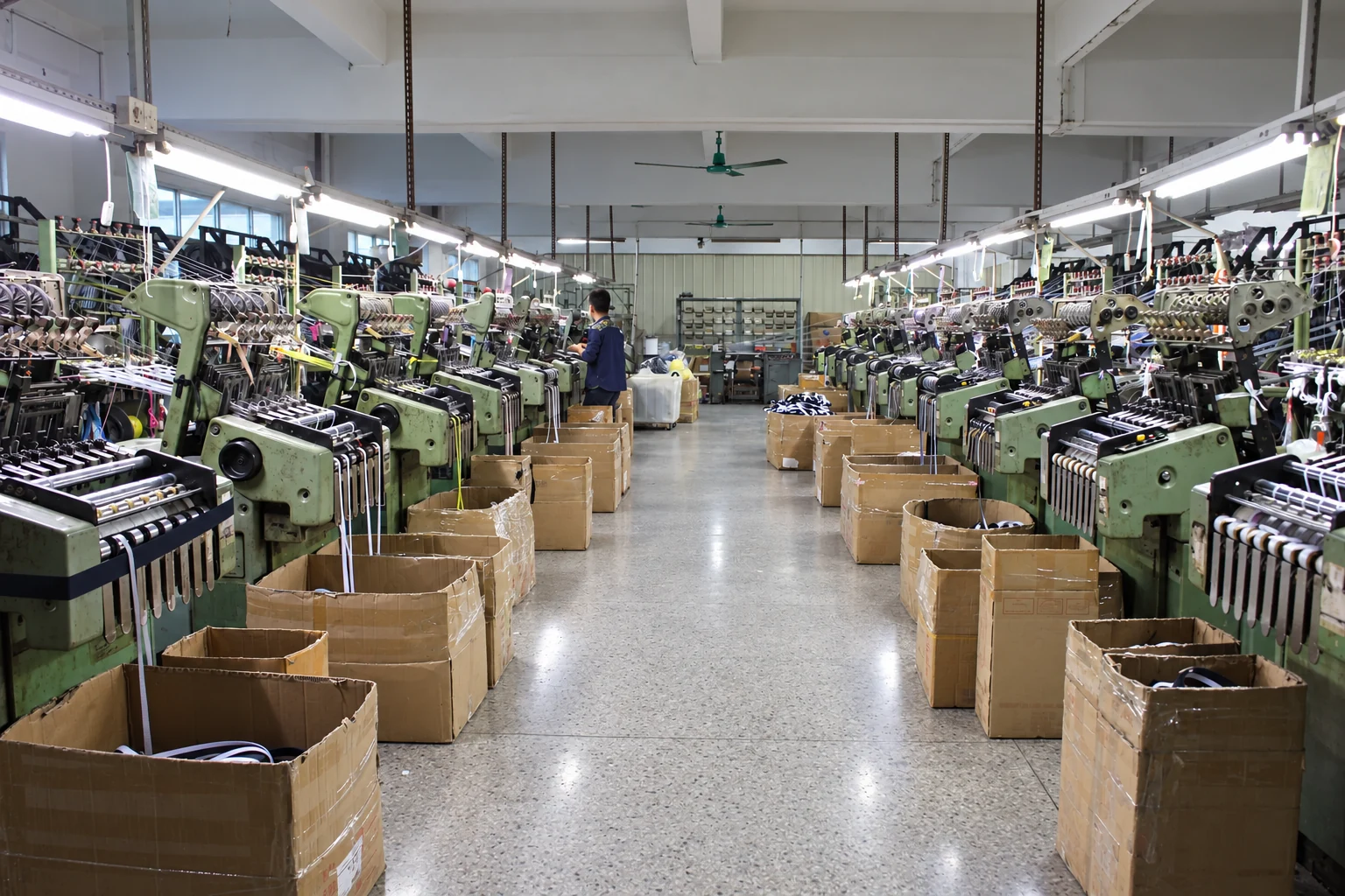 AI-assisted visual: Rows of webbing production machinery